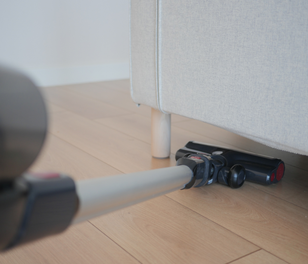 Maid-Serv professional vacuuming carpet in Salt Lake City home
