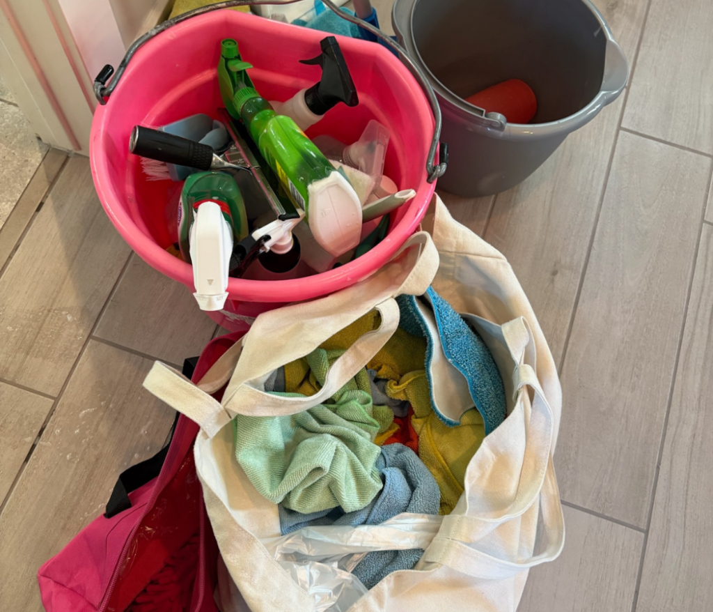 Maid-Serv cleaner using checklist during Salt Lake City cleaning
